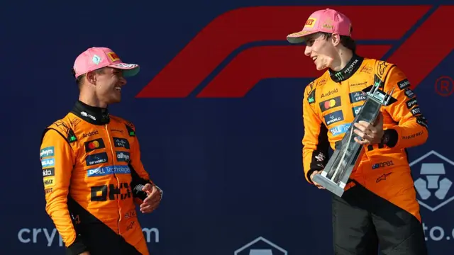 Lando Norris and Oscar Piastri on podium at the 2025 Miami Grand Prix