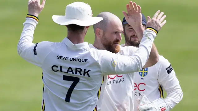 Ben Raine celebrates taking wicket