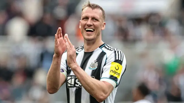Dan Burn celebrates
