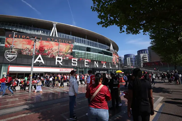 Fans outside Emirates Stadium