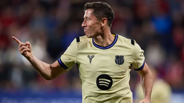 Robert Lewandowski celebrates scoring