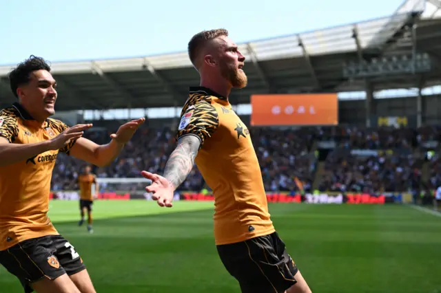 Ollie McBurnie celebrates giving Hull the lead over Norwich