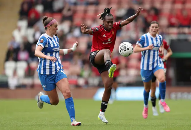 Melvine Malard of Manchester United controls the ball while under pressure from Caitlyn Hayes of Brighton & Hove Albion during the Barclays Women's Super League match between Manchester United and Brighton & Hove Albion at Progress with Unity Stadium on May 02, 2026.