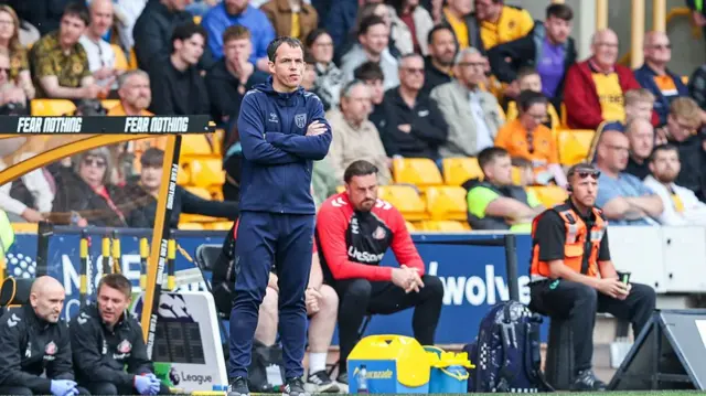 Regis Le Bris on the touchline