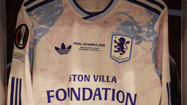 A detailed view of the Aston Villa match shirt, with the details 'Final Istanbul 2026, Besiktas Park 20 May, SC Freiburg v Aston Villa' seen embroidered inside the dressing room