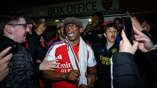 Ian Wright among the Arsenal fans outside the Emirates