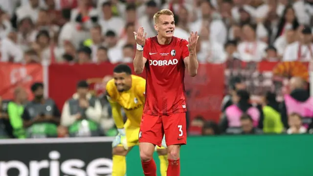 Philipp Lienhart of Sport-Club Freiburg reacts after Youri Tielemans of Aston Villa (not pictured) scores
