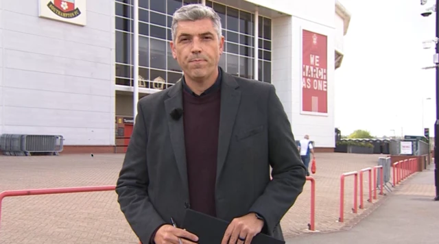 Lews Coombes outside St Mary's Stadium