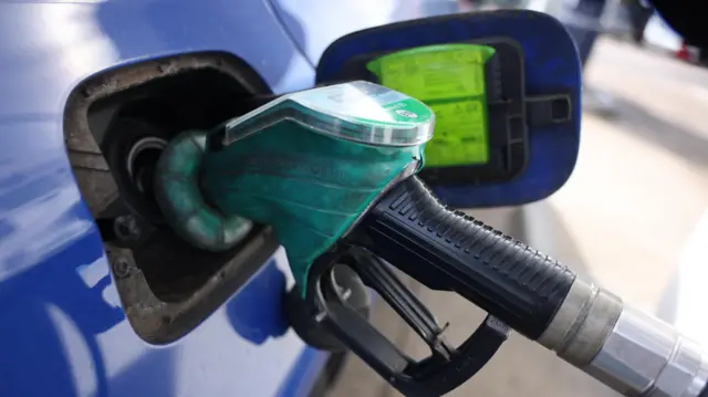 A fuel pump in a petrol station forecourt