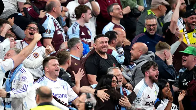 The fans of Aston Villa celebrate after Emi Buendia of Aston Villa (not pictured) scores