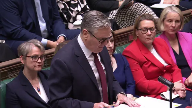 Keir Starmer looks down as he speaks in the House of Commons