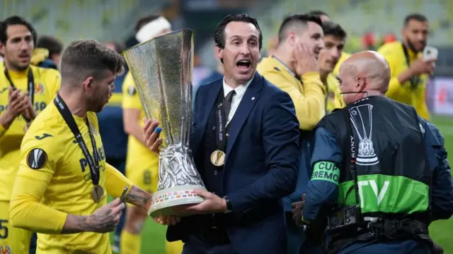 Uani Emery with the Europa League trophy