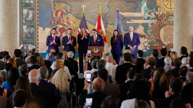 Acting U.S. Attorney General, Todd Blanche speaks, while with U.S. Attorney for the Southern District of Florida, Jason A. Reding Quinones, President of Miami Dade College Madeline Pumariega, Co-Deputy Director of the FBI, Christopher Gilbert Raia, U.S. Senator Ashley Moody (R-FL) and Florida Attorney General James Uthmeier, as the U.S. Department of Justice announces criminal charges against former Cuban President Raul Castro, during a ceremony to honor the victims of the 1996 shootdown of Brothers to the Rescue aircraft incident, at Freedom Tower in Miami, Florida, U.S., May 20, 2026.