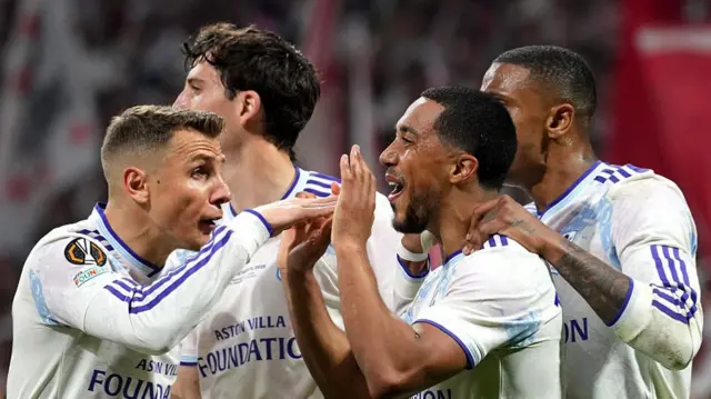 Youri Tielemans of Aston Villa celebrates with teammates