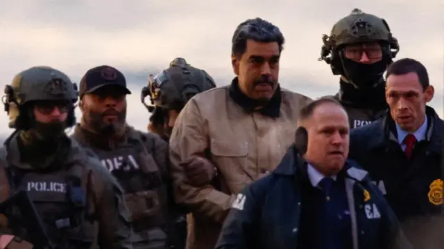 Captured Venezuelan President Nicolas Maduro arrives at the Downtown Manhattan Heliport, as he heads towards the Daniel Patrick Manhattan United States Courthouse for an initial appearance to face U.S. federal charges including narco-terrorism, conspiracy, drug trafficking, money laundering and others in New York City, U.S., January 5, 2026.