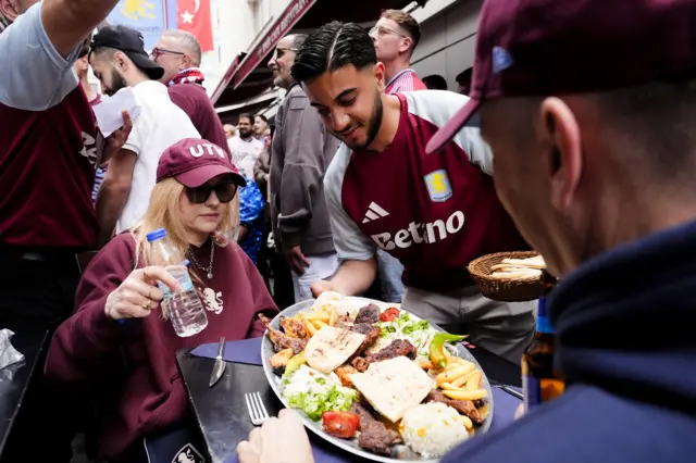 Villa fans tuck into a feast in Istanbul