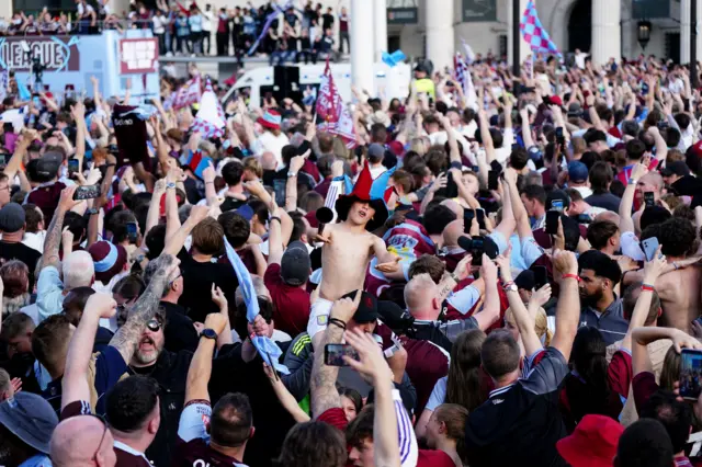 Fans celebrate in Birmingham during the Aston Villa parade.