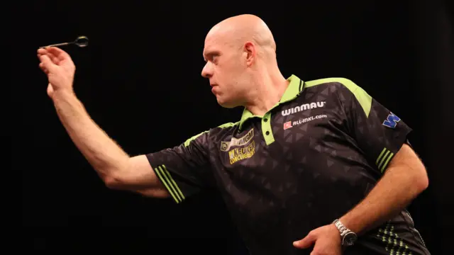 Michael van Gerwen in action against Luke Humphries during night sixteen of the 2026 BetMGM Premier League at the Utilita Arena, Sheffield