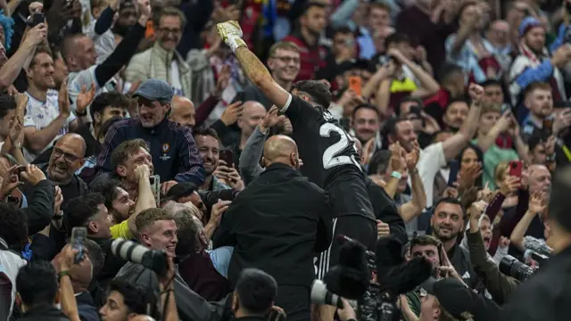 Emiliano Martinez celebrates with the crowd in Istanbul