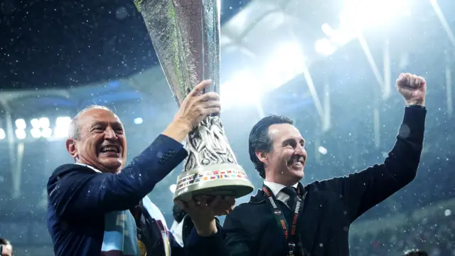 Unai Emery, Manager of Aston Villa, and Nassef Sawiris, Chairman of Aston Villa, celebrate with the UEFA Europa League trophy
