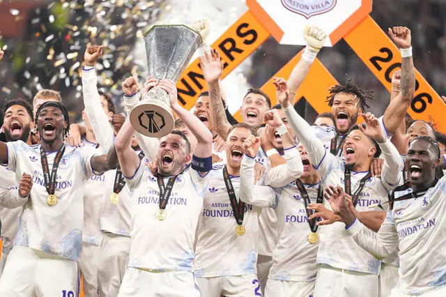 John McGinn lifts the Europa League trophy