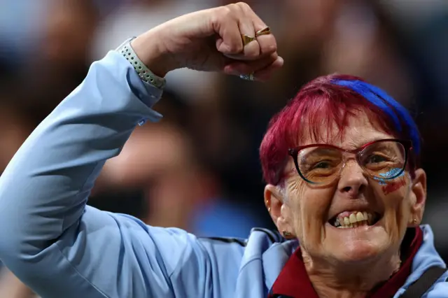 Aston Villa fan punches the air