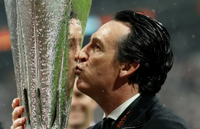 Aston Villa manager Unai Emery kisses the trophy as he celebrates after winning the UEFA Europa League REUTERS/Isabel Infantes