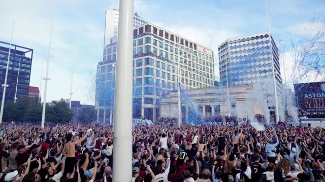 Villa fans packed into a square during the parade.