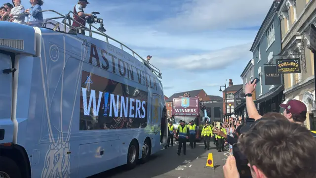 The Aston Villa parade bus travels down Hall Street, Birmingham