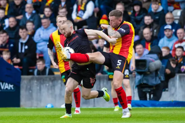 St Mirren's Allan Campbell and Partick Thistle's Lee Ashcroft in action