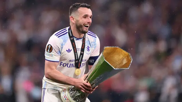 John McGinn holds Europa League trophy