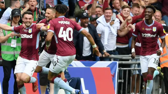 John McGinn celebrates