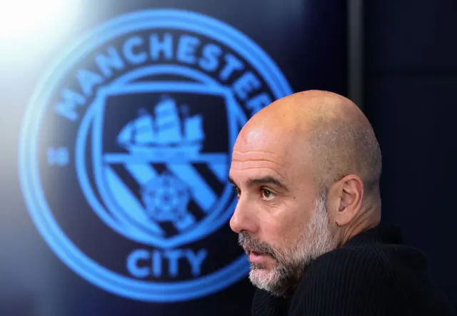 Pep Guardiola, Manager of Manchester City speaks to the press