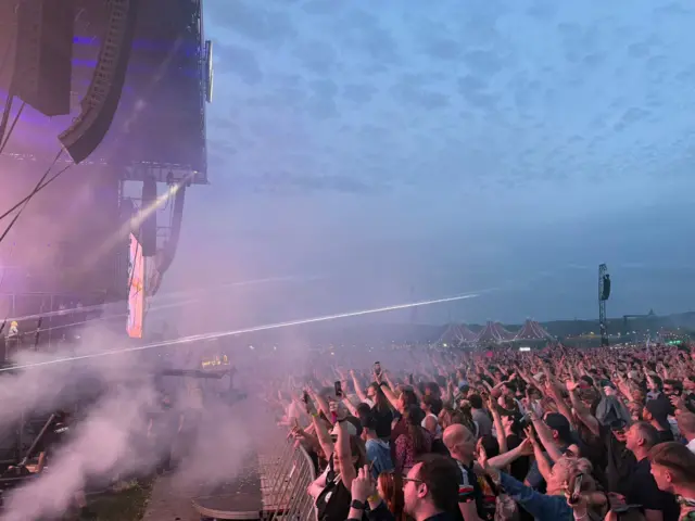 Crowd in front of Big Weekend Main Stage seen from the side