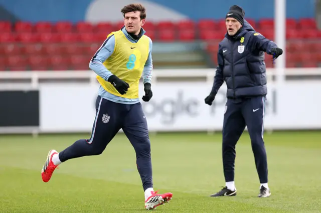 Harry Maguire and England manager Thomas Tuchel,