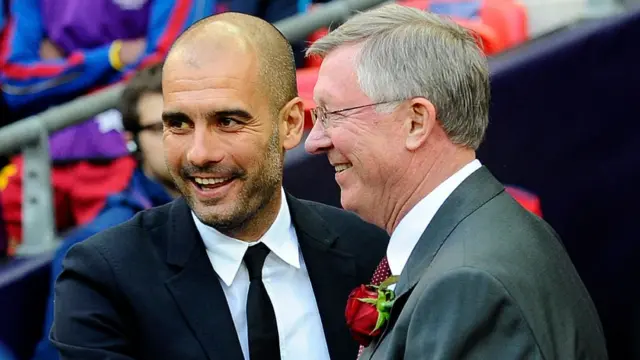 Barcelona's Spanish coach Josep Guardiola (L) embraces Manchester United manager Alex Ferguson