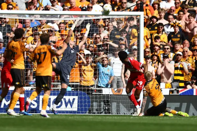 Oliver McBurnie of Hull City hits the cross bar with his header