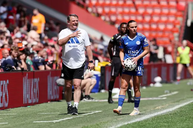 Passmoor shouts instructions from the sideline