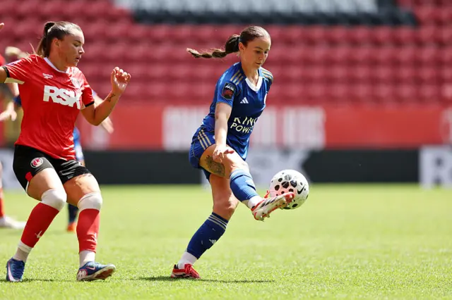 Leicester player dribbles through midfield