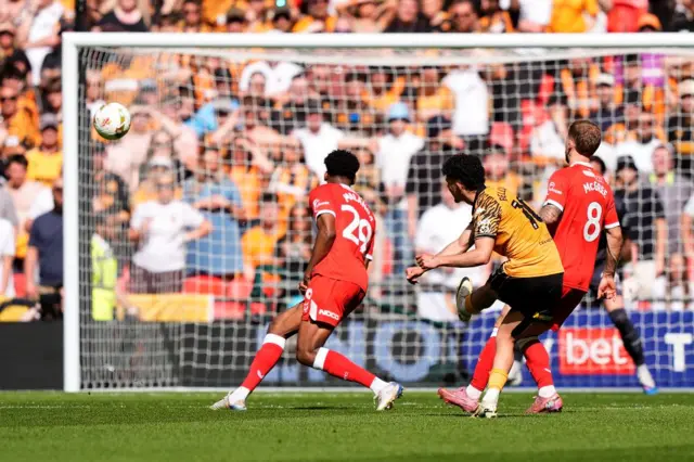 Hull City's Mohamed Belloumi (centre) misses an opportunity on goal
