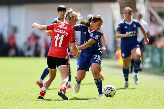 Williams holds off a Charlton player