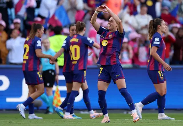 Pajor makes a heart with her hands, her trademark celebration