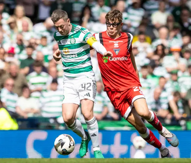 Celtic's Callum McGregor (L) and Dunfermline's Andy Tod in action during the Scottish Gas Men's Scottish Cup Final between Celtic and Dunfermline Athletic at Barclays Hampden, on May 23, 2026, in Glasgow
