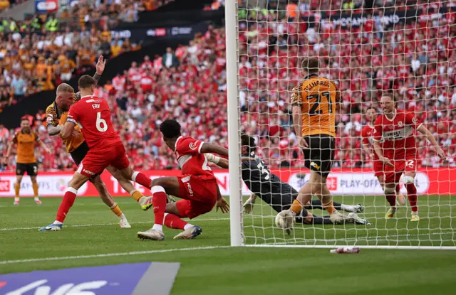 Oliver McBurnie of Hull City scores