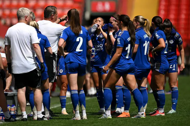 Players take on water during a stoppage