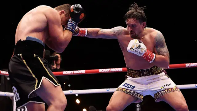 Usyk punches Verhoeven