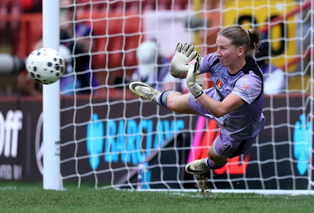 Sophie Whitehouse of Charlton Athletic saves the fifth penalty from Noemie Mouchon of Leicester Cit
