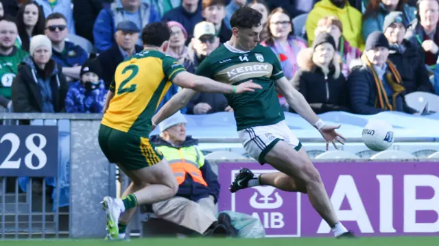 Caolan McColgan challenges David Clifford