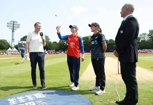 Captain of England Charlie Dean and Captain of New Zealand Amelia Kerr take part in the coin toss ahead of the 2nd Women's Vitality IT20 match between England and New Zealand at The Spitfire Ground