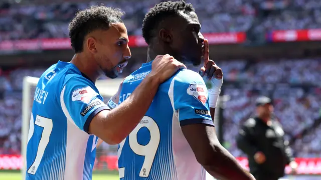 Adama Sidibeh celebrates scoring